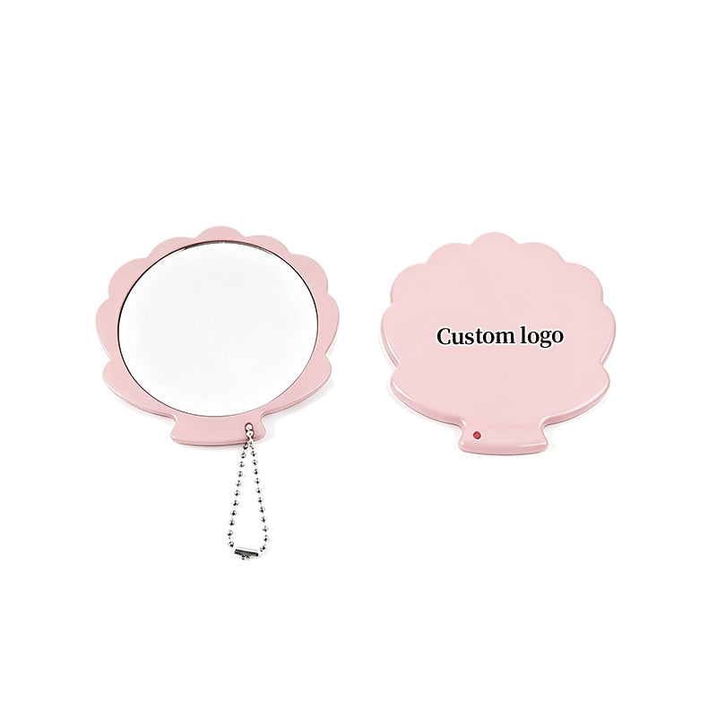 OEM/ODM Seashell Pocket Makeup Mirror from Kaifam Manufacturing. Custom logo, Pantone colors, MOQ 100pcs, 15-day lead time. Request a free quote.