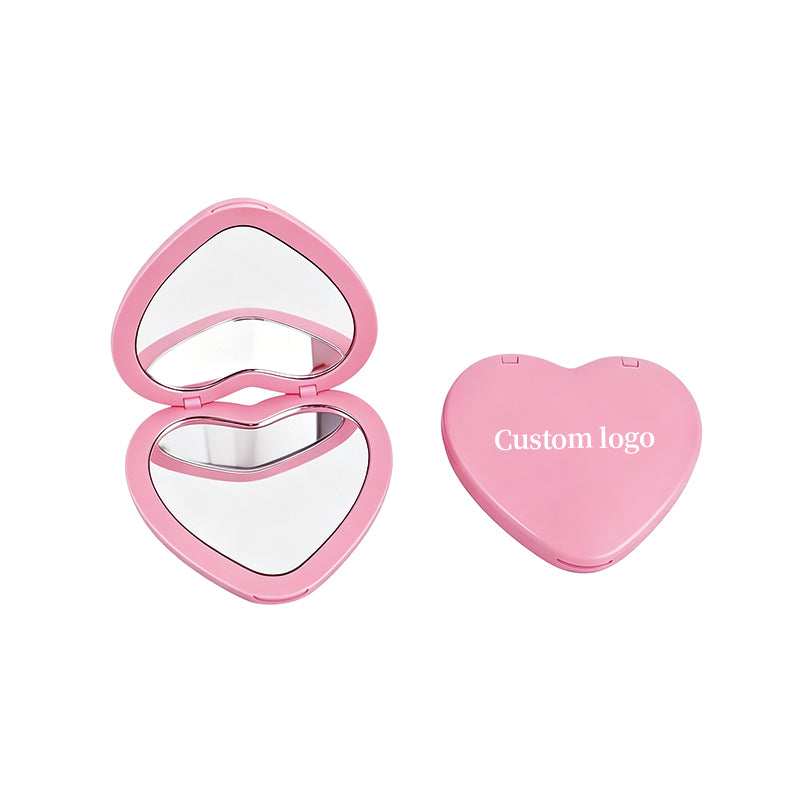 OEM/ODM ouble Sided Heart Compact Mirror from Kaifam Manufacturing. Custom logo, Pantone colors, MOQ 100pcs, 15-day lead time. Request a free quote.