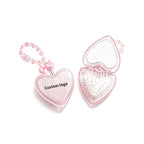 OEM/ODM Transparent Glitter Heart Flip Travel Comb with Built-in Mirror from Kaifam Manufacturing. Custom logo, Pantone colors, MOQ 100pcs, 15-day lead time. Request a free quote.
