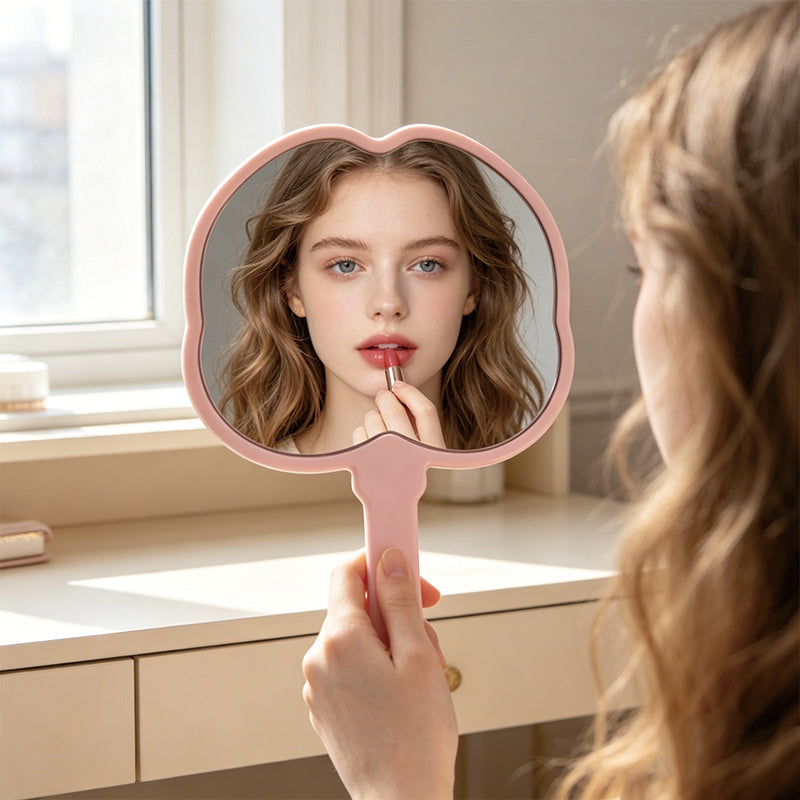 OEM/ODM Peach Shaped Hand Mirror from Kaifam Manufacturing. Custom logo, Pantone colors, MOQ 100pcs, 15-day lead time. Request a free quote.