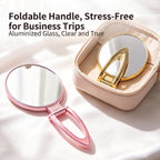 OEM/ODM Foldable Handheld Double Sided Round Makeup Mirror from Kaifam Manufacturing. Custom logo, Pantone colors, MOQ 100pcs, 15-day lead time. Request a free quote.