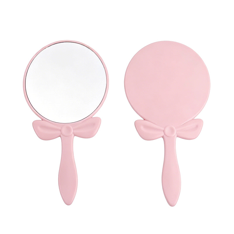 OEM/ODM Bow-knot Round Hand Mirror from Kaifam Manufacturing. Custom logo, Pantone colors, MOQ 100pcs, 15-day lead time. Request a free quote.