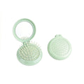 OEM/ODM Round Foldable Airbag Comb With Mirror from Kaifam Manufacturing. Custom logo, Pantone colors, MOQ 100pcs, 15-day lead time. Request a free quote.