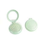 OEM/ODM Round Foldable Airbag Comb With Mirror from Kaifam Manufacturing. Custom logo, Pantone colors, MOQ 100pcs, 15-day lead time. Request a free quote.