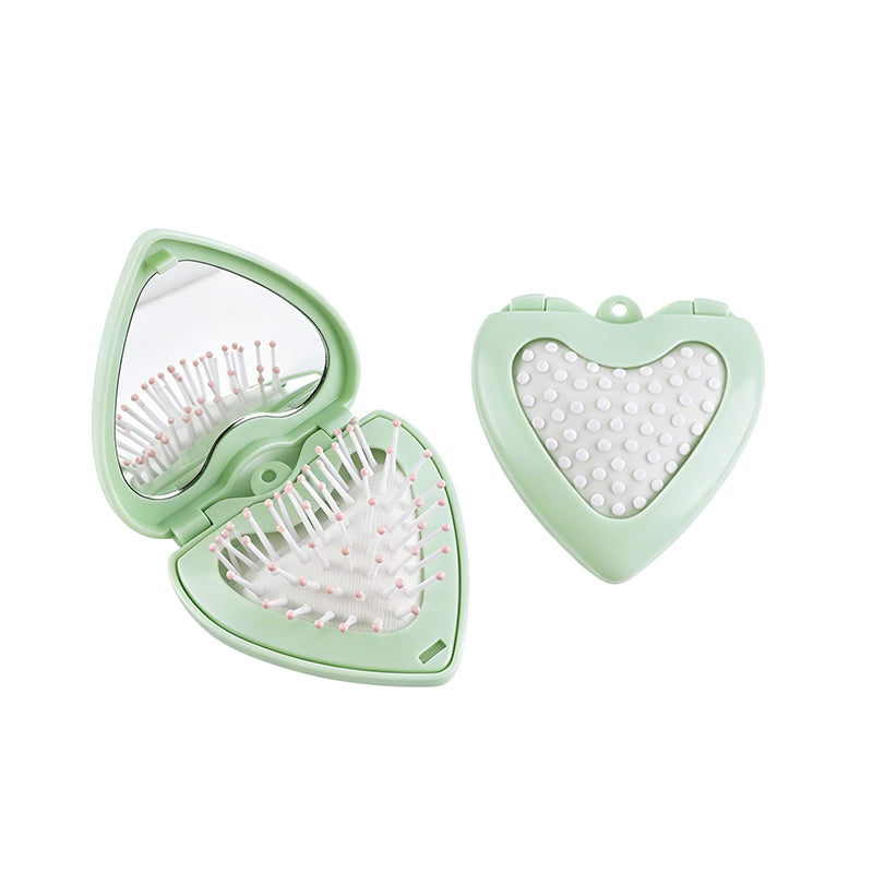 OEM/ODM Heart Flip Open Airbag Massage Comb with Built-in Mirror from Kaifam Manufacturing. Custom logo, Pantone colors, MOQ 100pcs, 15-day lead time. Request a free quote.