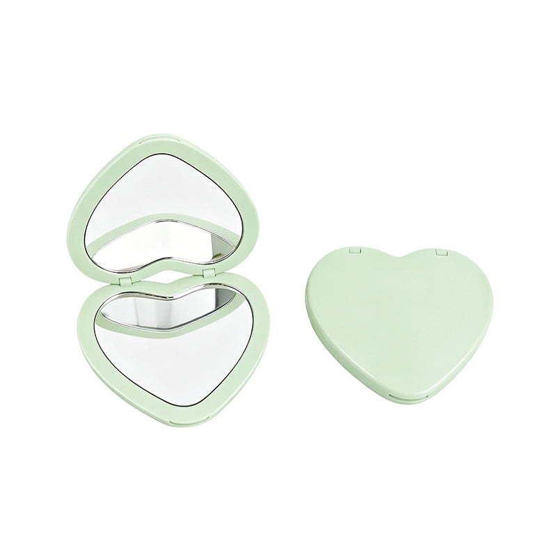 OEM/ODM ouble Sided Heart Compact Mirror from Kaifam Manufacturing. Custom logo, Pantone colors, MOQ 100pcs, 15-day lead time. Request a free quote.