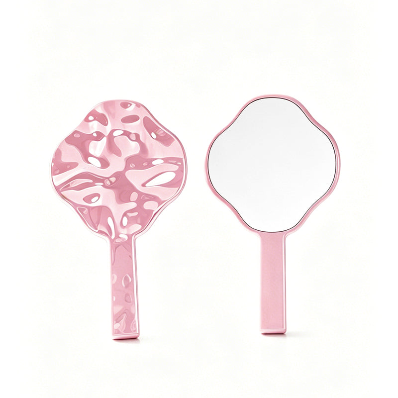 OEM/ODM Four-petaled flower with an irregular electroplated design, available as a handheld mirror from Kaifam Manufacturing. Custom logo, Pantone colors, MOQ 100pcs, 15-day lead time. Request a free quote.