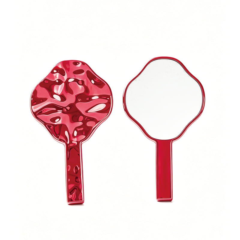 OEM/ODM Four-petaled flower with an irregular electroplated design, available as a handheld mirror from Kaifam Manufacturing. Custom logo, Pantone colors, MOQ 100pcs, 15-day lead time. Request a free quote.